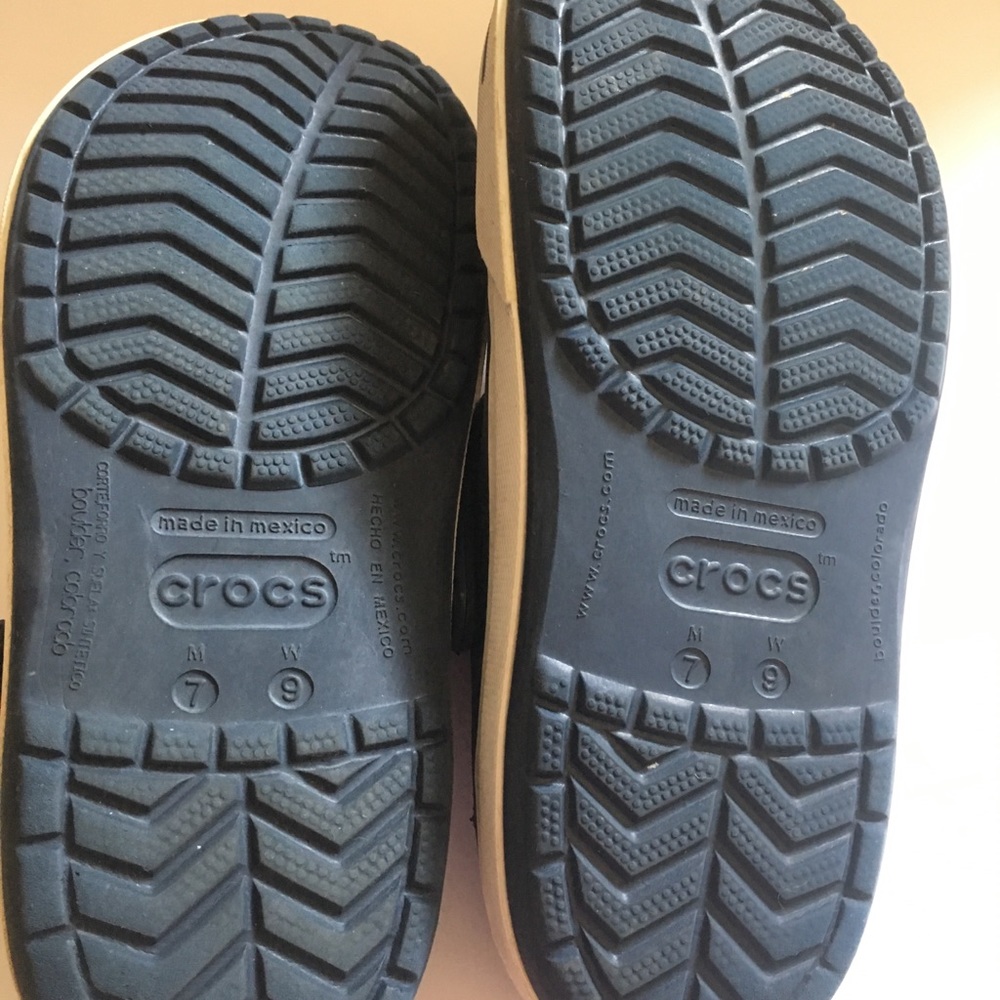 Navy blue crocs.